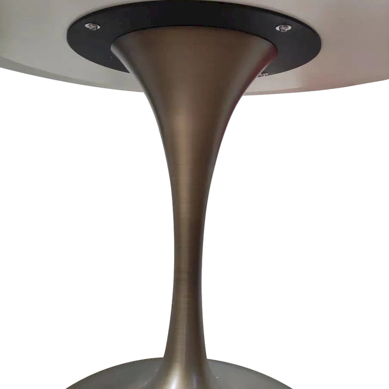 Table à manger ronde en pierre frittée avec piédestal en fer