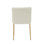 Chaise de salle à manger moderne capitonnée avec pieds en laiton doré